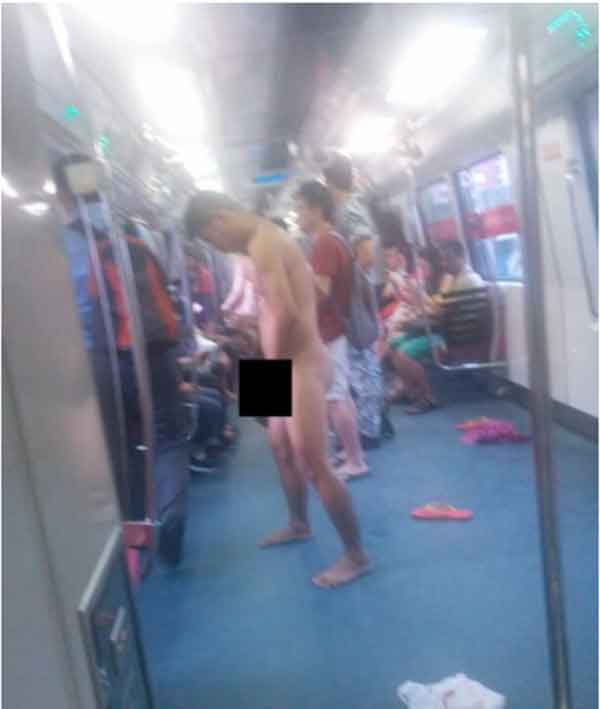 Singapore Strips Naked Man on MRT Train Arrested Talk Cock Sing Song