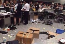 China Passengers Throw Meal Boxes and Water Bottles over Airport Service Counter Talk Cock Sing Song