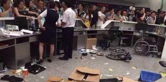 China Passengers Throw Meal Boxes and Water Bottles over Airport Service Counter Talk Cock Sing Song